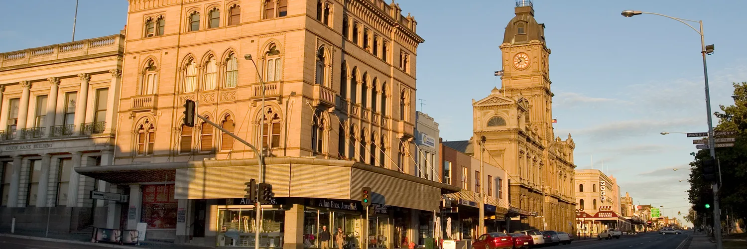 Heritage buildings and the town hall clock tower on Ballarat's main street in early morning sun