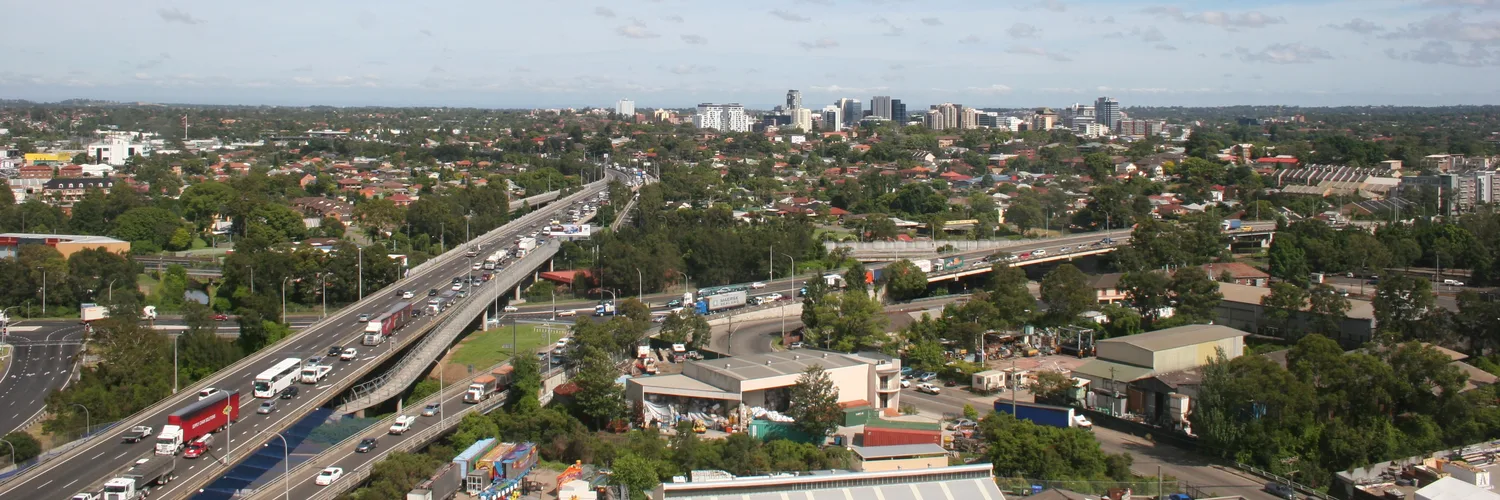 Aerial view over Western Sydney towards the Parramatta CBD