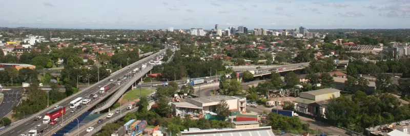 Aerial view over Western Sydney towards the Parramatta CBD