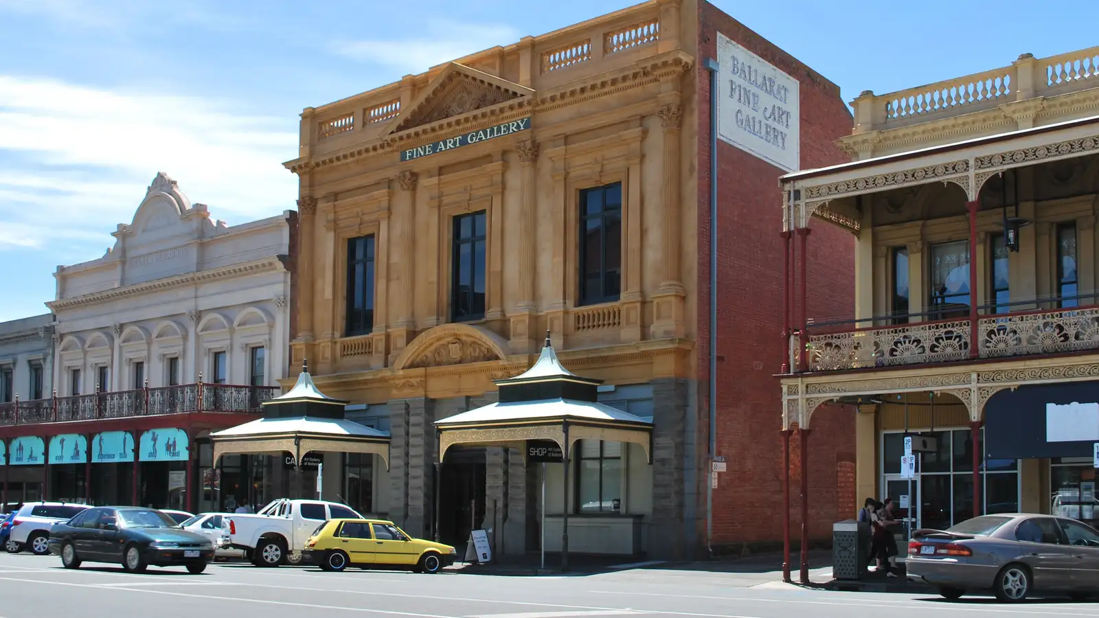 Art Gallery of Ballarat and neighbouring heritage buildings on Lydiard Street under a blue sky