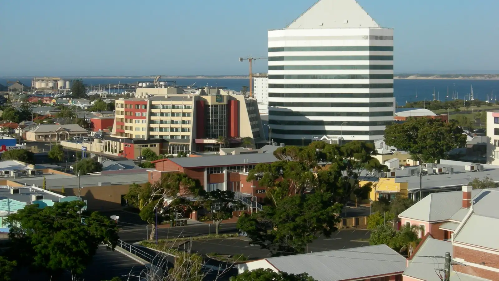 View over central Bunbury toward Koombana Bay, with the city's landmark tower and the Indian Ocean behind