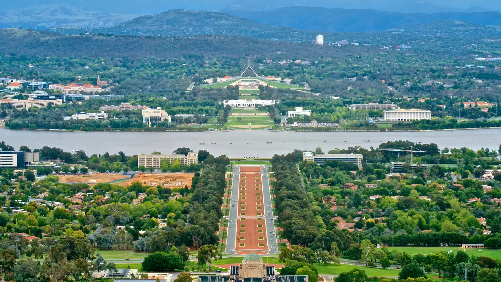 View from Mount Ainslie down Anzac Parade across Lake Burley Griffin to Parliament House, Canberra
