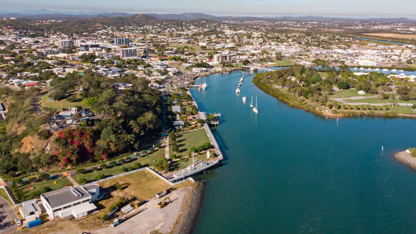 Aerial view over Gladstone Central, the East Shores foreshore and the harbour channel