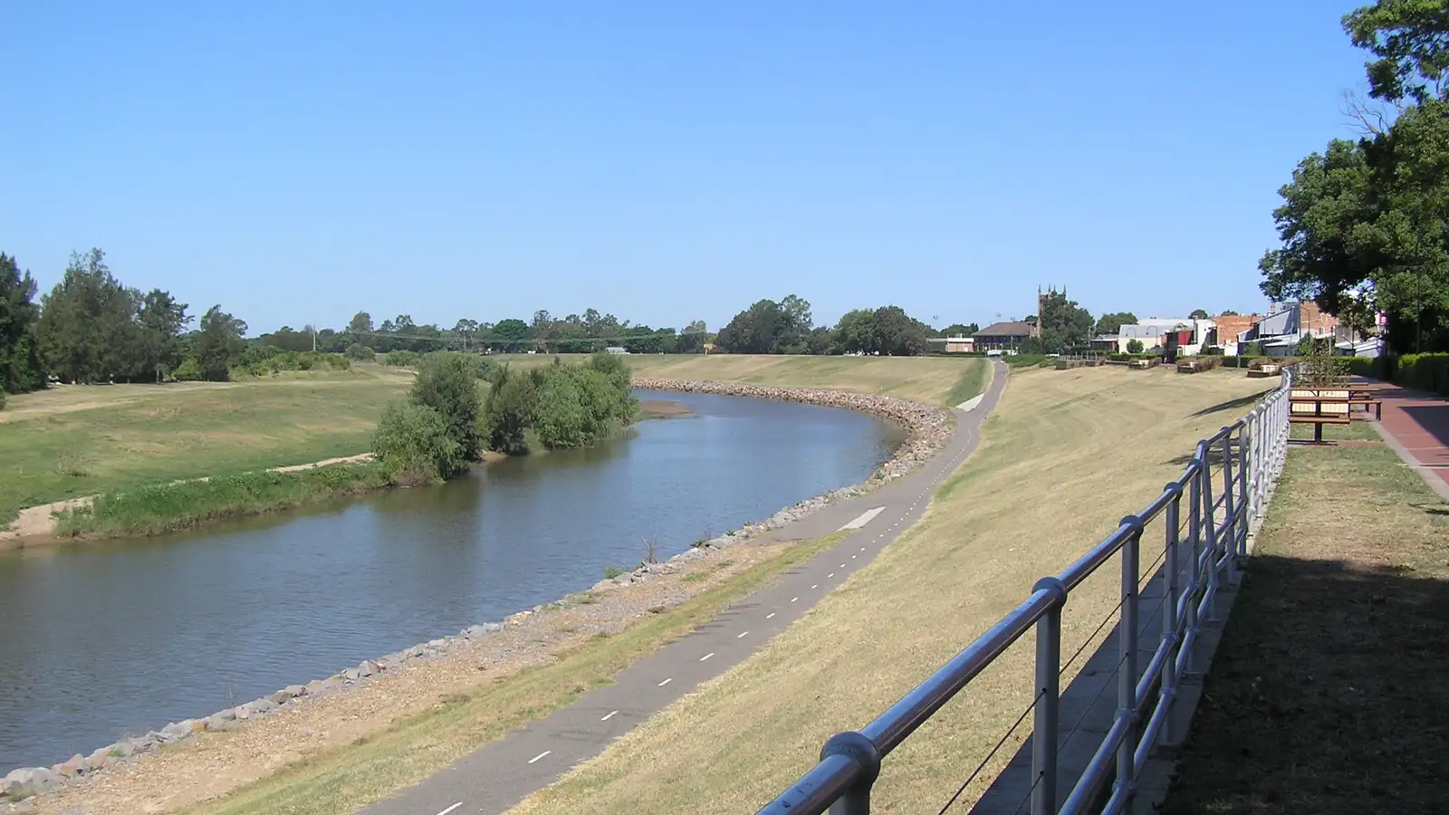 Hunter River at Maitland from the levee-top river walk, with green river flats on a clear day