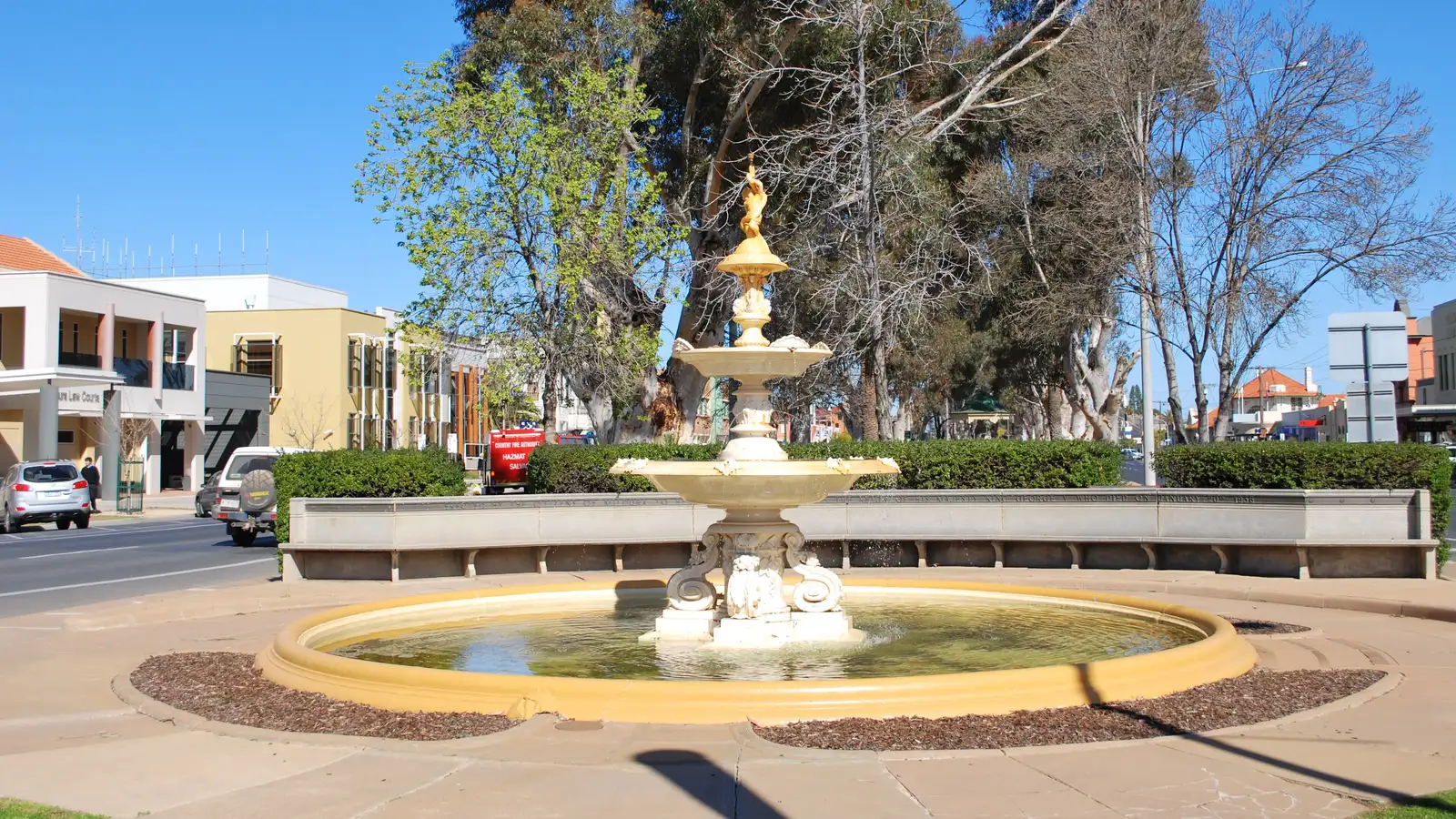 Ornamental fountain in a landscaped median on a sunny Mildura street