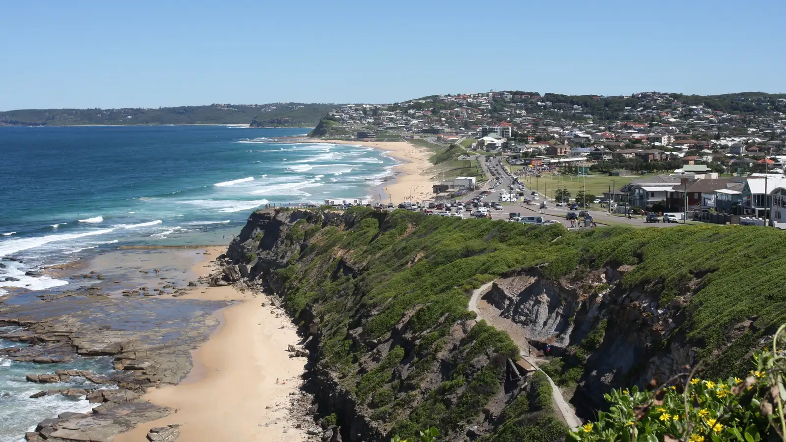 Newcastle coastline from Susan Gilmore Beach to Merewether, with houses on the hills behind
