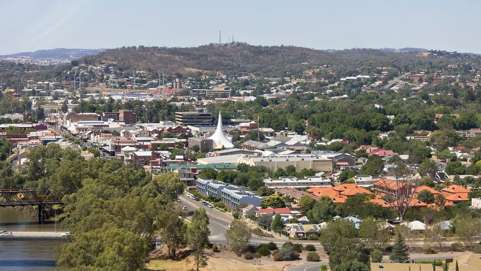 Aerial view over central Wagga Wagga toward the surrounding hills on a clear day